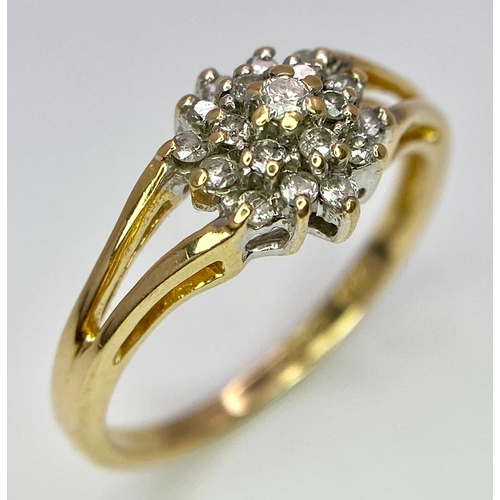 444 - An 18K Yellow Gold Diamond Cluster Ring. 0.25ctw diamonds. Size N. 2.6g total weight.