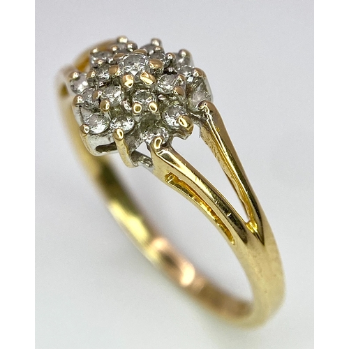 444 - An 18K Yellow Gold Diamond Cluster Ring. 0.25ctw diamonds. Size N. 2.6g total weight.