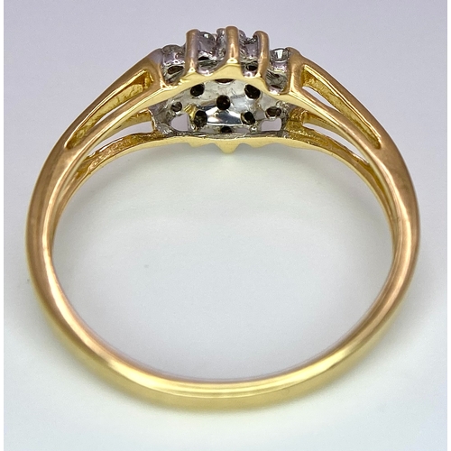 444 - An 18K Yellow Gold Diamond Cluster Ring. 0.25ctw diamonds. Size N. 2.6g total weight.