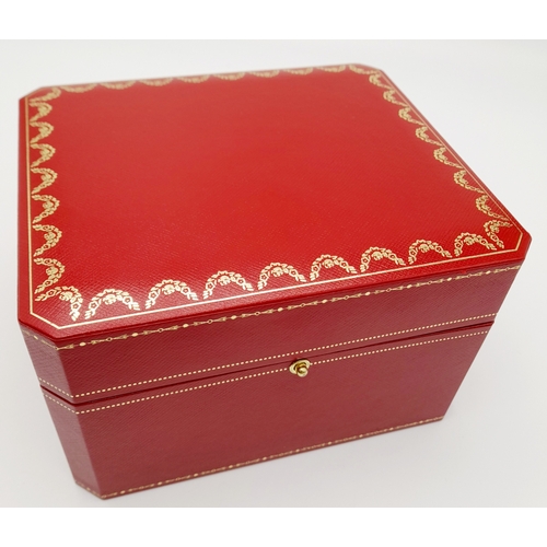 486 - A Cartier Watch Case. Red exterior, plush black textile interior. For a large watch.