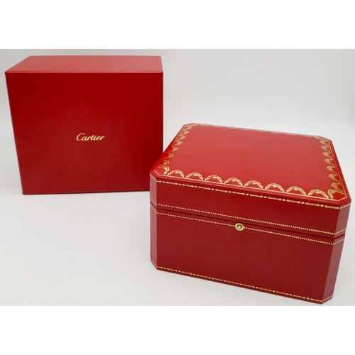 486 - A Cartier Watch Case. Red exterior, plush black textile interior. For a large watch.