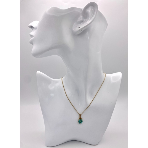 526 - A 9K Yellow Gold Turquoise Pendant on a 9K Yellow Gold Disappearing Necklace. 2cm and 44cm. 1.75g to... 