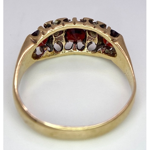 647 - A 9K Yellow Gold, Garnet and Diamond Ring. Size K, 1.9g total weight. Comes in presentation case.