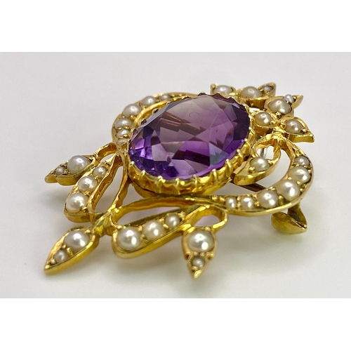 668 - A 15K Yellow Gold Amethyst and Seed Pearl Brooch/Pendant. 1.8cm amethyst, 3.5cm length. 6.6g total w... 