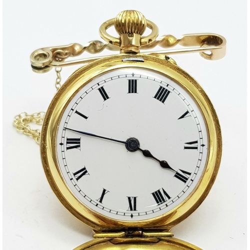 9 - A Vintage 18K Gold Miniature Pocket Watch. A beautifully engraved half-hunter design. Top winder. Wh... 