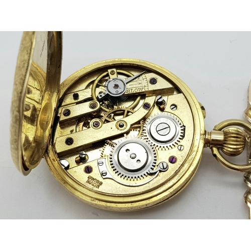 9 - A Vintage 18K Gold Miniature Pocket Watch. A beautifully engraved half-hunter design. Top winder. Wh... 