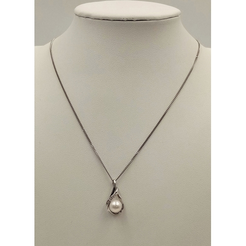 240 - A 9ct White Gold Diamond and Pearl Necklace, 6mm pearl size, 0.05ct diamond, 20” chain length, 4.5g ... 