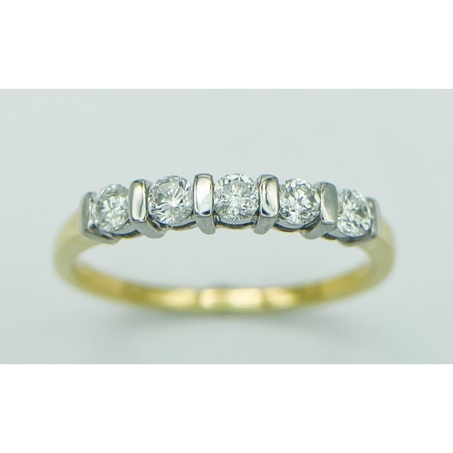 257 - AN 18K YELLOW GOLD AND DIAMOND 5 STONE RING. 0.25CT. 1.8G. SIZE J.