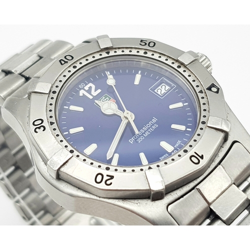 277 - A TAG-HEUER LADIES PROFESSIONAL STAINLESS STEEL WATCH WITH AMAZING NAVY BLUE DIAL .   32mm COMES IN ... 