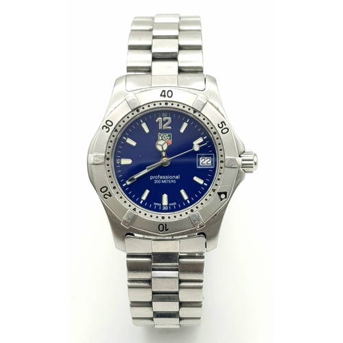 277 - A TAG-HEUER LADIES PROFESSIONAL STAINLESS STEEL WATCH WITH AMAZING NAVY BLUE DIAL .   32mm COMES IN ... 