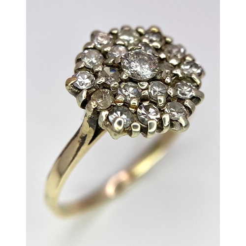 285 - A 9K YELLOW GOLD DIAMOND CLUSTER RING. 0.50CT. 2.4G. SIZE M.