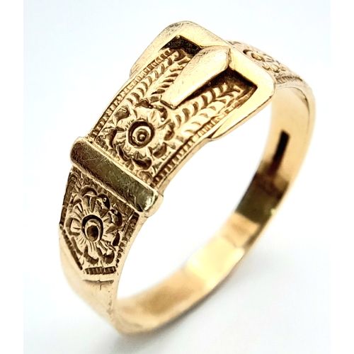 422 - A 9 K yellow gold ornate ring with belt and Buckle design, size: Y, weight: 4 g.