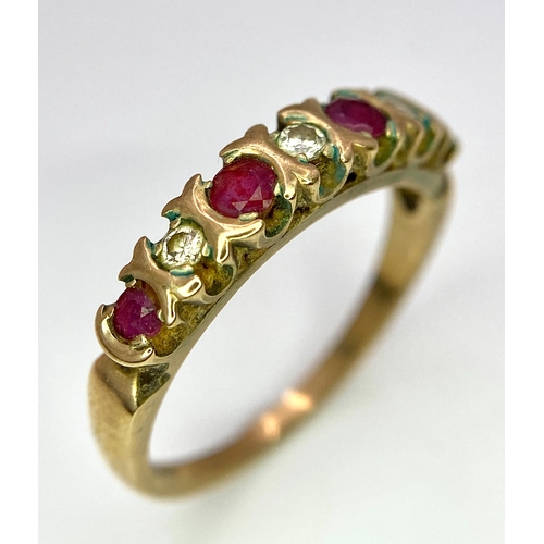 477 - A vintage, 9 K yellow gold ring with a band of alternating round cut diamonds and rubies. Size: N, w... 