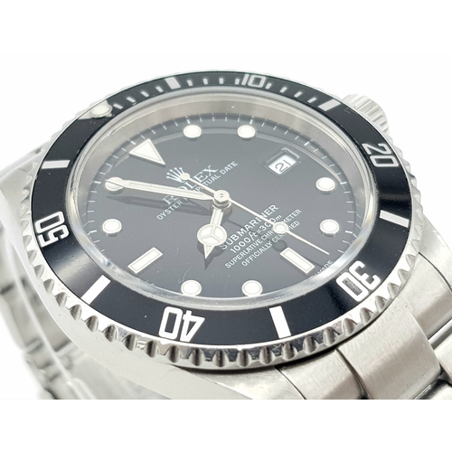 10 - A Rolex Submariner Oyster Perpetual Date Watch. Stainless steel bracelet and case - 40mm. Black dial... 