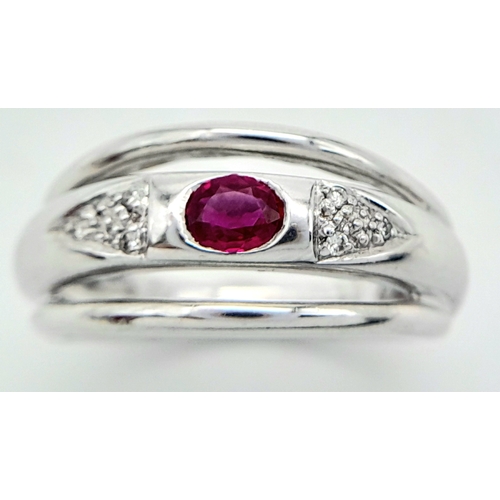 114 - AN 18K WHITE GOLD DIAMOND & RUBY RING. Size N, 6.6g total weight. Ref: SC 8068