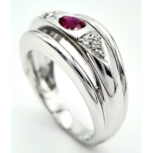 114 - AN 18K WHITE GOLD DIAMOND & RUBY RING. Size N, 6.6g total weight. Ref: SC 8068