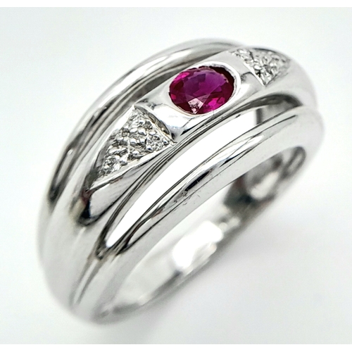 114 - AN 18K WHITE GOLD DIAMOND & RUBY RING. Size N, 6.6g total weight. Ref: SC 8068