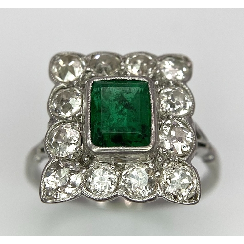 116 - AN 18K WHITE GOLD (TESTED) EDWARDIAN OLD CUT DIAMOND AND EMERALD CLUSTER RING. 1.20CT OF OLD CUT DIA... 