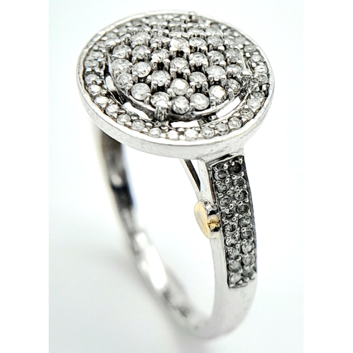 302 - A 9K WHITE GOLD DIAMOND RING. 0.55crw, Size O, 2.6g total weight. Ref: SC 8027