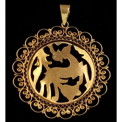 360 - A very elegant, 18 K yellow gold pendant with a deer and vegetation surrounded by refined scrollwork... 