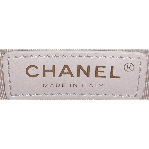 365 - A Chanel Two-Way Chain Shoulder Bag. Beige caviar leather.
Gold tone hardware. Spacious interior wit... 