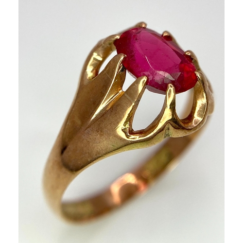 487 - A vintage, 9 K rose gold solitaire ring with an oval cut ruby, ring size: U, weight: 3.8 g.