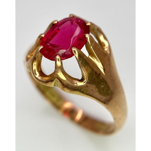 487 - A vintage, 9 K rose gold solitaire ring with an oval cut ruby, ring size: U, weight: 3.8 g.