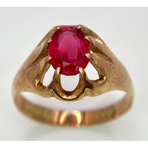 487 - A vintage, 9 K rose gold solitaire ring with an oval cut ruby, ring size: U, weight: 3.8 g.