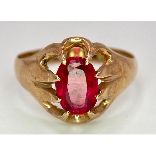 487 - A vintage, 9 K rose gold solitaire ring with an oval cut ruby, ring size: U, weight: 3.8 g.