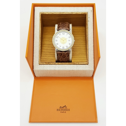 284 - A FABULOUS HERMES OF PARIS GENTS WATCH WITH WHITE DIAL AND CIRCULAR CENTRAL LOGO ON A BROWN CROCODIL... 