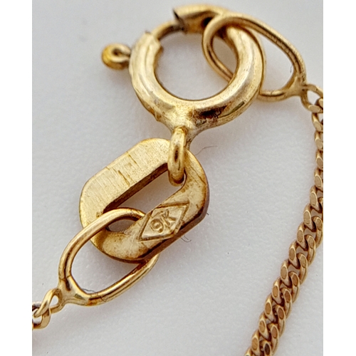 386 - A 9 K yellow gold chain necklace with a heart pendant adorned with a single round cut diamond, chain... 