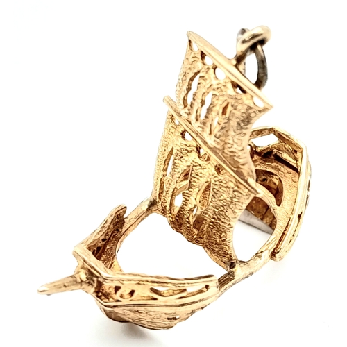 419 - A 9K YELLOW GOLD PIRATE SHIP CHARM. 3.4cm length, 5.2g weight. Ref: SC 8138