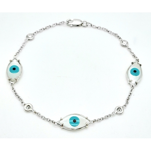 261 - An 18K White Gold Delicate Evil Eye and Diamond Bracelet. 17cm. 3g total weight. Ref: 016673