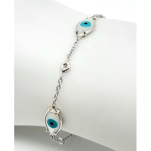 261 - An 18K White Gold Delicate Evil Eye and Diamond Bracelet. 17cm. 3g total weight. Ref: 016673