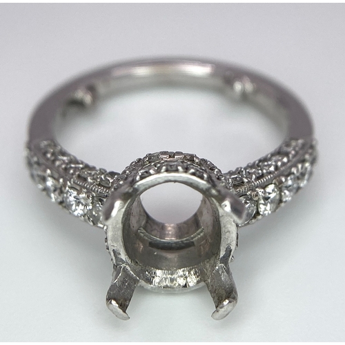 31 - AN 18K WHITE GOLD 4 CLAW SINGLE STONE RING WITH DIAMOND SET BEZEL, SHOULDERS AND SIDES - Ready to mo... 