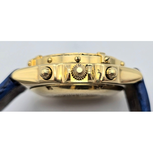 316 - An 18K Gold Breitling Chronograph Gents Watch. Breitling blue leather strap with 18k gold clasp. 18k... 