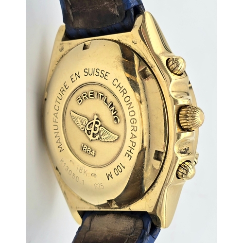 316 - An 18K Gold Breitling Chronograph Gents Watch. Breitling blue leather strap with 18k gold clasp. 18k... 