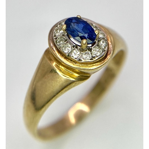 320 - A 9K YELLOW GOLD, DIAMOND AND SAPPHIRE RING. 2.7G. SIZE N.