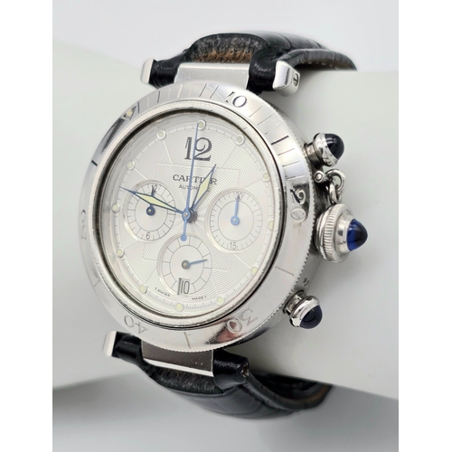 323 - An Automatic Cartier Pasha 2113 Chronograph Gents Watch.
Black leather Cartier strap. Stainless stee... 