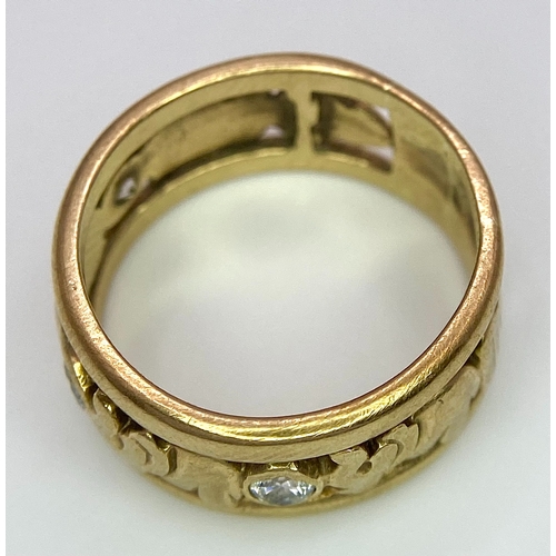 327 - A 9K YELLOW GOLD (TESTS AS) DIAMOND SET ELEPHANT BAND RING. 0.20CT. 4.1G. SIZE J 1/2.