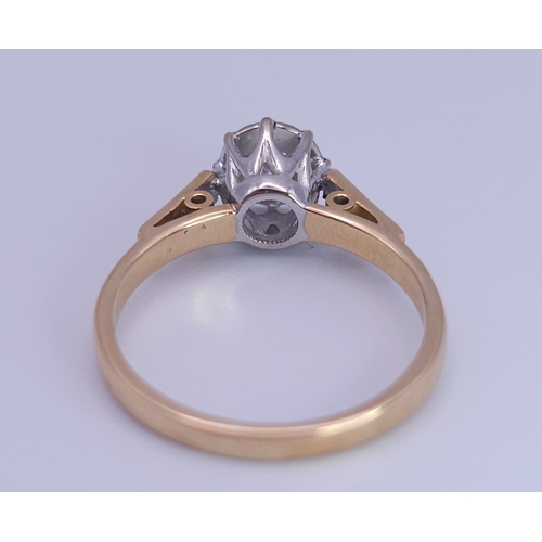 348 - AN 18K YELLOW GOLD DIAMOND SOLITAIRE RING. 3.4G. SIZE O.