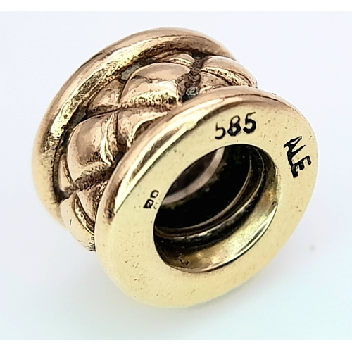 433 - A 14K YELLOW GOLD PANDORA CHARM. 8mm diameter, 2.5g weight. Ref: SC 8136