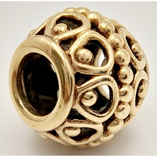 446 - A 14K YELLOW GOLD PANDORA CHARM. 9mm length, 2.2g weight. Ref: SC 8135