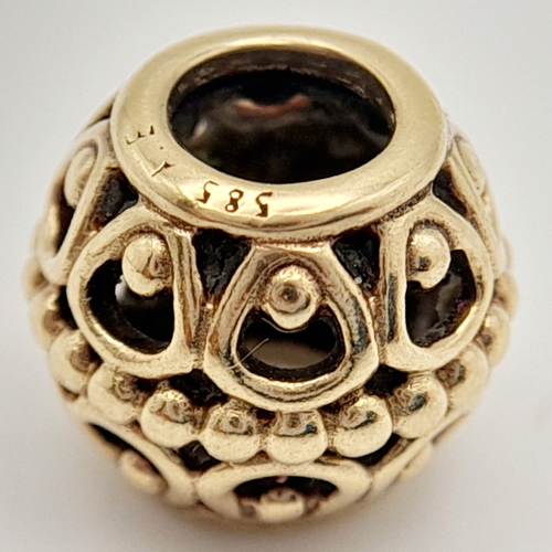 446 - A 14K YELLOW GOLD PANDORA CHARM. 9mm length, 2.2g weight. Ref: SC 8135