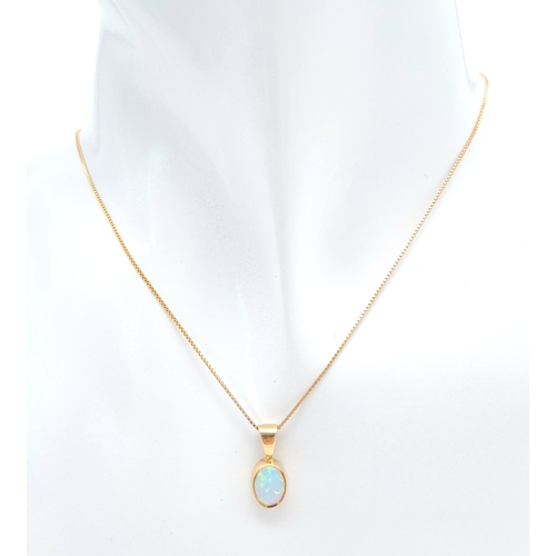 458 - A 9k yellow gold opal pendant on 18 inch box chain 2.1g. approx 15mm x 7mm pendant.

ref: TB03