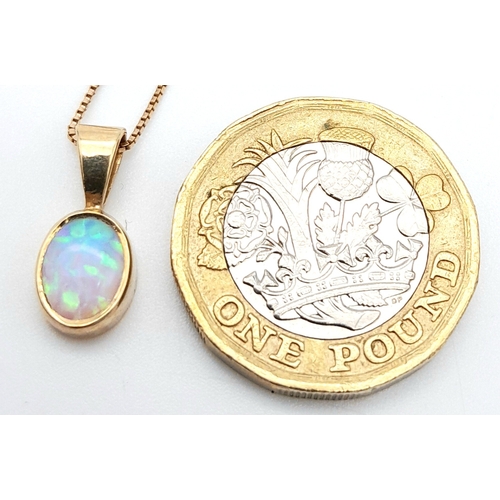 458 - A 9k yellow gold opal pendant on 18 inch box chain 2.1g. approx 15mm x 7mm pendant.

ref: TB03