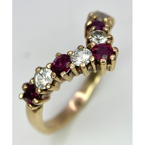 479 - A 9ct Yellow Gold Clear and Red Stone Set Ring, size N, 3.1g weight.

ref: SH1469I