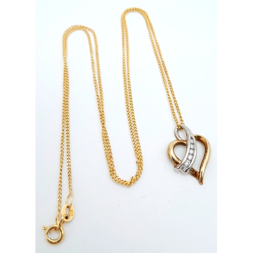 499 - A 9 K yellow gold chain necklace with a heart pendant beautifully crossed over with a band of diamon... 