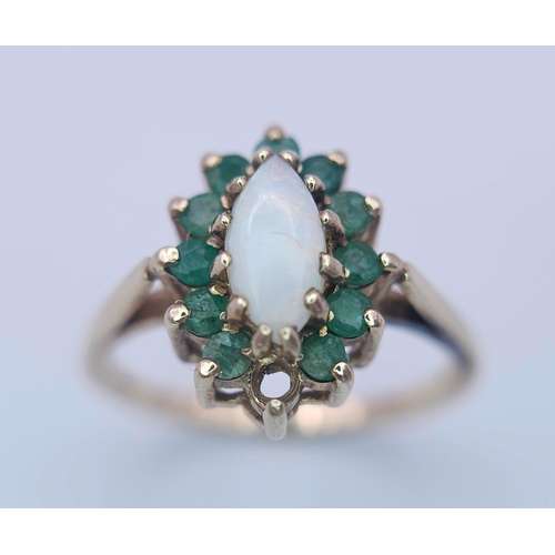 523 - A 9K YELLOW GOLD OPAL & EMERALD CLUSTER RING. (1 stone missing)
Size M, 2.5g total weight. Ref: SC 8... 