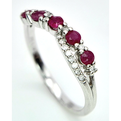 530 - A 9K WHITE GOLD DIAMOND & RUBY RING. Size O 1/2, 2.2g total weight. Ref: SC 8046